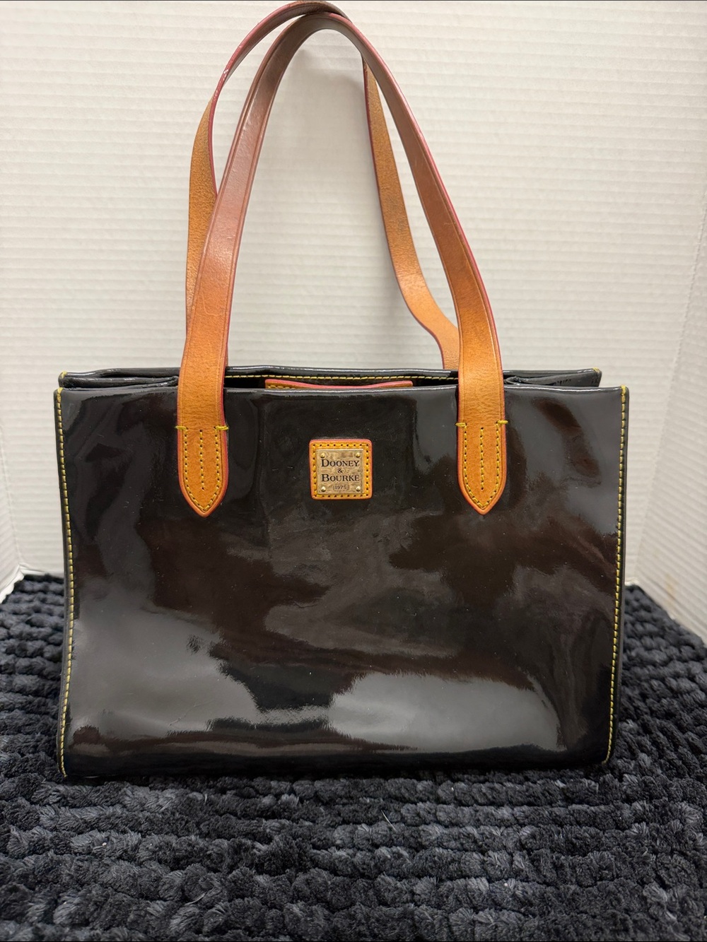 Dooney & Bourke Black Patent Tote with Brown Leather Handles